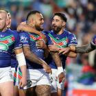 Warriors players celebrate after Addin Fonua-Blake scores a try during the NRL semifinal.  Photo...