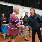 Dave Kempton, seen here congratulating Shaun when he was awarded his Selwyn Schools’ honours tie...