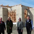 Pictured in front of the construction site for a new community lodge at Observatory Village in...