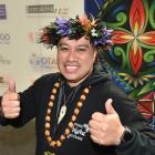 Pesamino Tili embraces the positive atmosphere at Otago Polyfest on Wednesday. PHOTO: GREGOR...