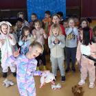 Maori Hill School pupil Riley Cutler, 6, and her classmates are conducted by the professional...