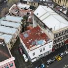 Demolition of several derelict buildings in central Dunedin  has been delayed. The first to go...
