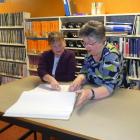New Zealand Society of Genealogists Dunedin branch education officer Heather Bray (left) and...