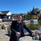 Lan Yuan Dunedin Chinese Garden Trust chairman Malcolm Wong places a hand on commemorative...