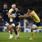 Scotland's Ali Price runs the ball up against Romania. Photo: Reuters