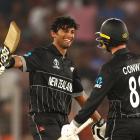 New&nbsp;Zealand's Rachin Ravindra celebrates with Devon Conway after reaching his century...