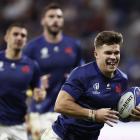 Matthieu Jalibert on his way to scoring France's fifth try against Italy in Lyon. Photo: Reuters 
