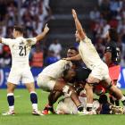 England players celebrate at the final whistle. Photo: Reuters