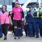 Police join radio hosts Patrina Roche and Callum Procter, who were walking around the Octagon for...