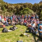 The Otago Tramping and Mountaineering Club and centenary attendees enjoy the fine weather at the...