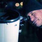 Dunedin astronomer Nick Simpson looks at star Alpha Crucis through a telescope at Naseby Domain....