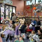Library assistant Dana Ashby entertains children and their toys at the teddy bears’ picnic in the...