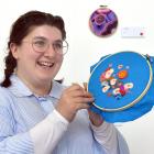 Textile artist Anna Craw works on a new piece at Artsenta yesterday. PHOTO: PETER MCINTOSH