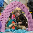 Saxijn Shallish-Van Delden, 5, takes part in A Murmuration of Bricks where children will add on...
