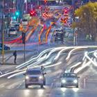 Traffic threads its way north and south on Dunedin’s one-way street system in this time exposure...