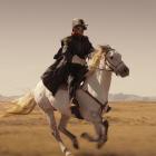Jed Brophy, cast in part for his skill on a horse, leads a militia posse.