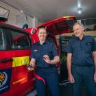 Arrowtown’s newest volunteer firefighter Sam McKeown and its longest serving firefighter Mark...