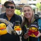 Neil Boniface and Fiona van Waveren-Wilshire, of Rotary Queenstown, hold the "best-dressed ducks"...