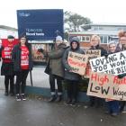 Awanui Laboratory phlebotomists picketed outside their workplace in July, seeking fairer pay....