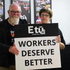 E tū delegates and support workers Gordon Cambridge and Pam King are urging a wage increase as...