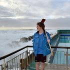 Lifeguard Riley Allibons waits for the sea to drop before cleaning the St Clair Hot Salt Water...