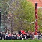 The pou whenua post marker sculpture is unveiled at the University of Otago yesterday morning....