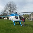 Sir Tim Wallis arrives in his helicopter at a celebration of 50 years of deer science at the...