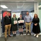 At the presentation of the Polson Higgs innovation competition are (from left) Tom Hanning, Zoe...