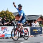 Otago rider James Gardner (Central Benchmakers-Willbike) celebrates winning stage one of the 67th...