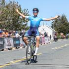 Australian Sam Jenner celebrates as he arrives in Lumsden to win stage two of the Tour of...