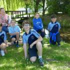 Queenstown Primary School Year 5 student Lincoln Moore, 10, front, with, from left, classmate...