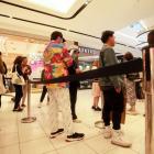 Shoppers hit the malls this year for Black Friday, but sales were not as high as in previous...