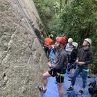 Otago Boys’ High School climbers Billy Gilchrist (red helmet) and James Hulyer (white) assess the...