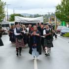 The Telford Graduation Parade, led by the Balclutha Pipe Band, makes its way along Clyde St,...