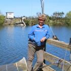 Colleen White enjoys a sunny last day of the whitebaiting season at the Aparima River in Riverton...