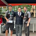 Sheldon Bagrie-Howley (left) and pairs partner Craig Tinker receive their runner-up certificate...