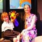 Educator Pip Tisdall and a student from Lawrence Area Primary School learning with Harold inside...