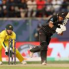 Black Cap Rachin Ravindra clips the ball into the legside during a Cricket World Cup match...
