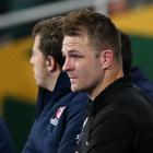 Sam Cane sits on the sideline at the Rugby World Cup final after getting a red card. Photo: Getty...