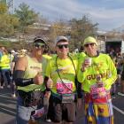 Blair McConnell (middle) ran with two guides – Anton McLean (left) from Christchurch and Mike...