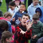 Lockhart Easton catches a grape-flavoured candy at the Weston School Fireworks at the Weston...