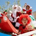 Santa took time out from his busy schedule to star at the Christmas Show Parade on Sunday. PHOTO:...