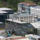 Demolition of the glass-fronted former Port Otago offices has begun. PHOTO: ODT FILES