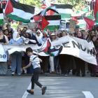 Protesters march in George St, Dunedin, on Saturday, as part of a rally for Palestine. They...