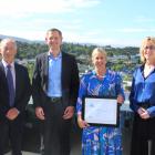 Ross Buckley and Trish Oakley flank Institute of Directors Otago-Southland branch emerging...