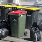 A mix of bins and bags await emptying and collecting in High St, Dunedin, yesterday. PHOTO:...