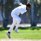 University-Grange seamer Shiv Achary sends down a delivery against CDK at Logan Park on Saturday....
