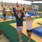 A new gym is sorely needed, Dunedin Gymnastic Academy members Holly Weatherall (left) and Saki...