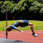 Giving his all at the high jump on Saturday is Hill City-University Children’s Athletics Club...