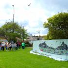 Port Chalmers School pupils perform a waiata during the unveiling of a new mural at the school....